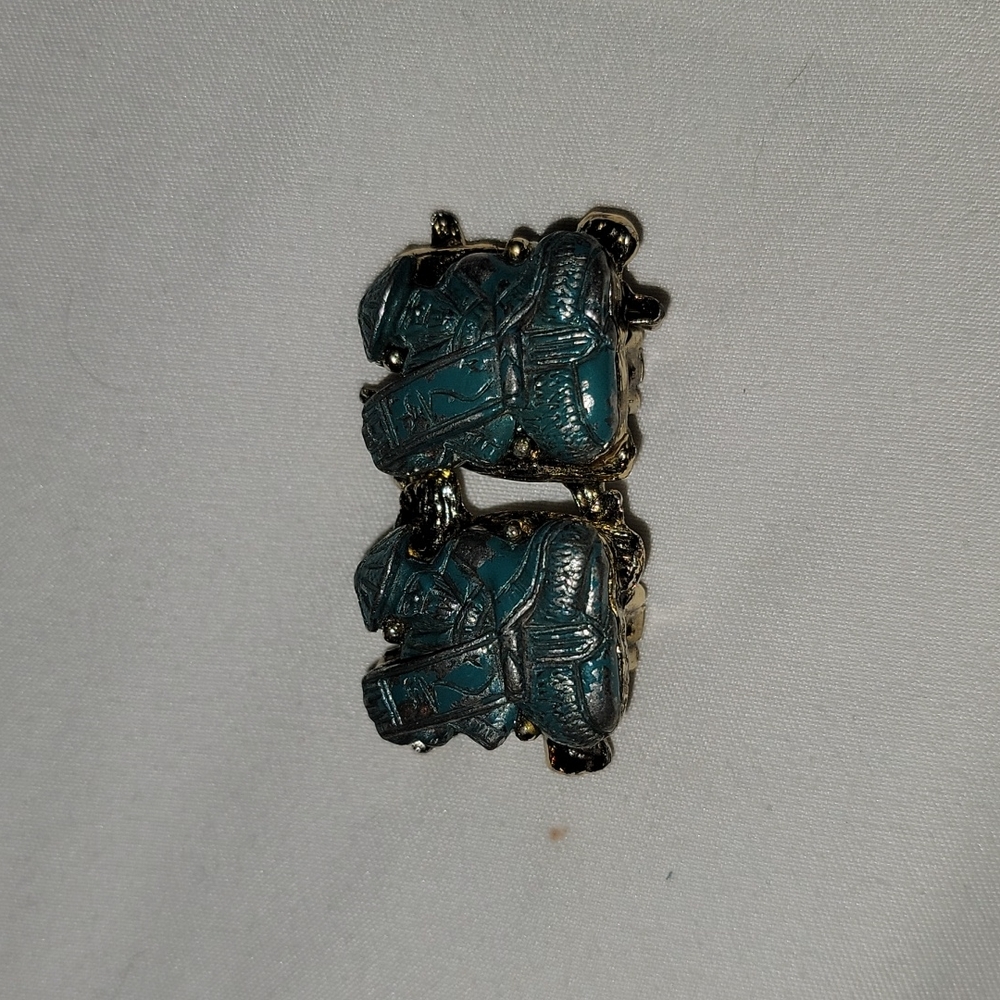 Oriental gold tone clip on earings